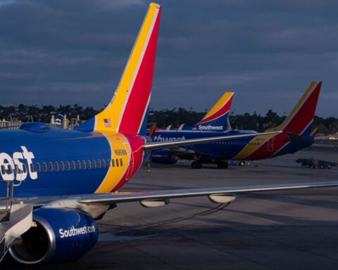 Southwest Airlines jet dives as a fighter jet crosses its path near Los Angeles