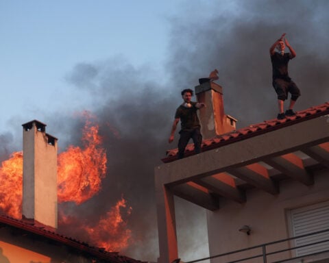Greece battles wildfires across country, evacuates villages
