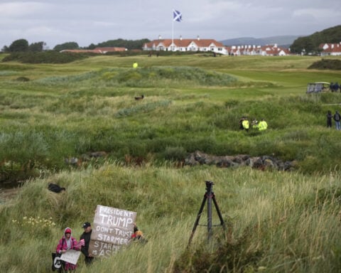Trump plays golf in Scotland while protesters take to the streets and decry his visit