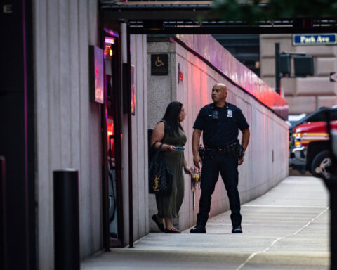 At least 2 people shot at Manhattan office building housing financial firms and NFL, source tells AP