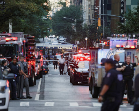 At least three victims shot in mid-Manhattan skyscraper; suspect 'neutralized'
