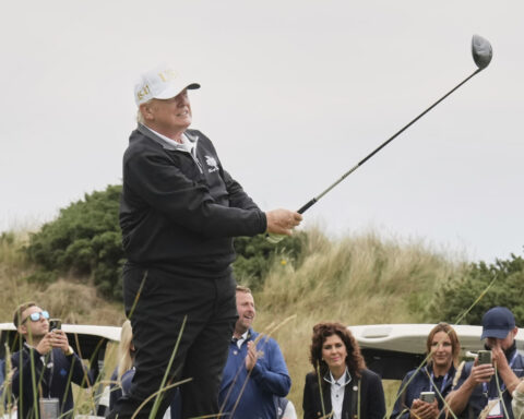 The Latest: Trump’s EPA moves to repeal finding that underpins US climate regulation