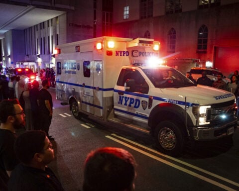 Victims of New York City shooting include a police officer and an executive at investment firm