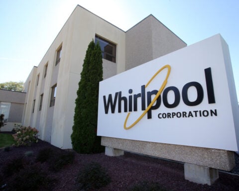 Whirlpool shares slump,; co slashes forecast and dividend