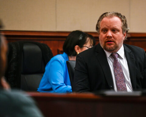 James Craig wipes tears during closing arguments in murder trial