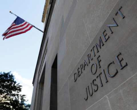 Two US Justice Dept antitrust officials fired over merger controversy, source says
