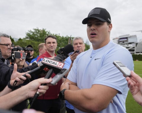 All-Pro Trey Hendrickson ends holdout and will report to Bengals, AP source says