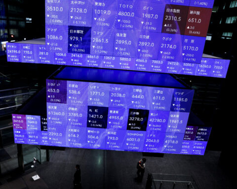 Global stock index dips, dollar climbs as Fed's Powell holds off on Sept rate cut verdict