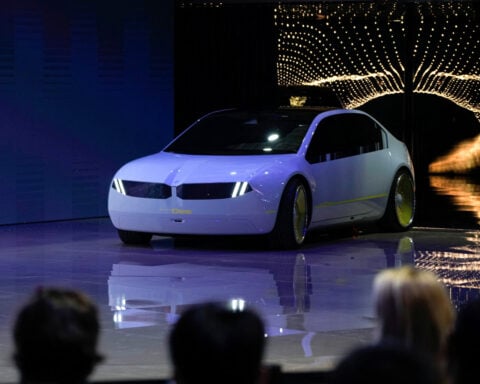 BMW sticks with guidance despite profit drop, Trump tariffs