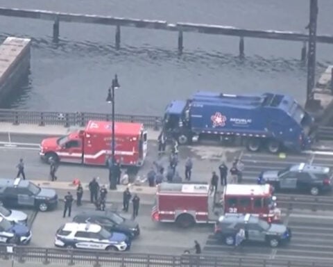 Man accused of stealing garbage truck, crashing on bridge after chase