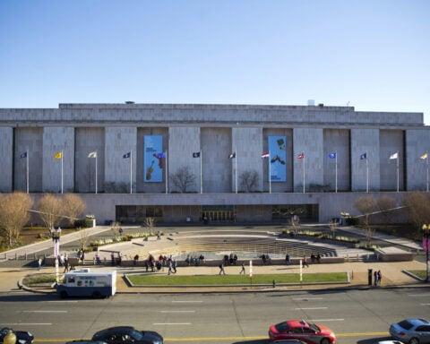 The Smithsonian removes a Trump impeachment reference from an exhibit but says it's temporary
