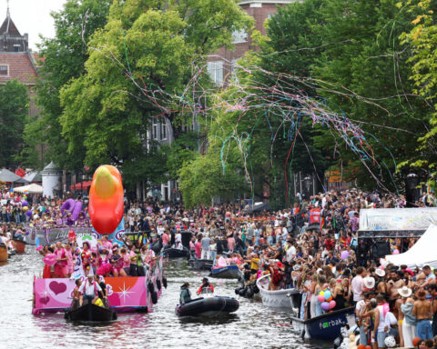Amsterdam Pride parade blends celebration and protest in LGBTQ+ show of solidarity