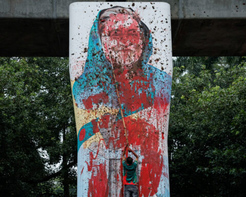 Bangladesh grapples with fraught politics a year after former PM Hasina fled