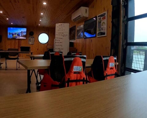 Floating classroom docks in Minnesota, offering free workshops