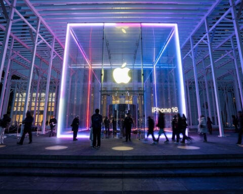 Apple will invest $100 billion to make US iPhone parts as Trump says a big chip tariff is coming