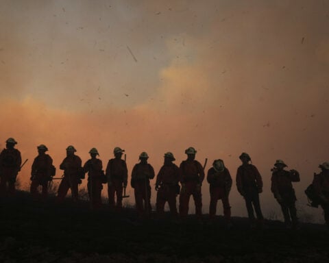 Firefighters make progress against blaze that forced thousands to flee north of Los Angeles