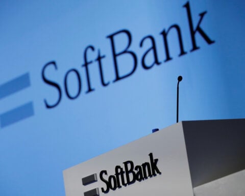SoftBank shares hit record high on AI prospects