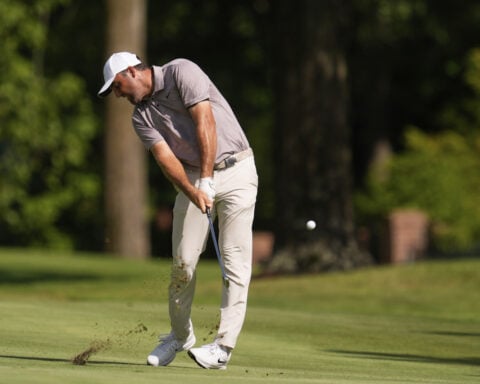 Justin Rose rallies late and beats Spaun in Memphis playoff