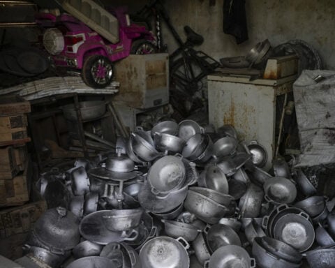 Migrants returning to Venezuela face debt and harsh living conditions