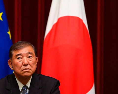 Japan's deepening political woes cloud budget, rate hike timing