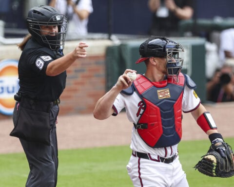 Pawol breaks gender barrier, earns good reviews for her work behind the plate on historic weekend