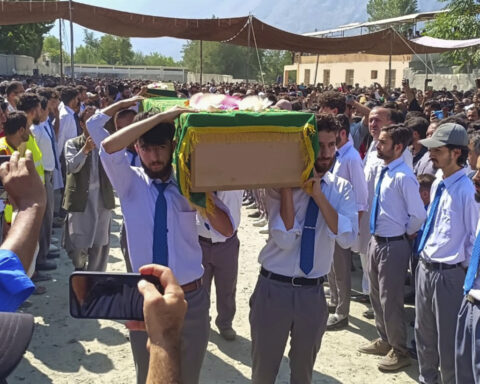 Massive mudslide kills 7 volunteers repairing flood damage in northern Pakistan