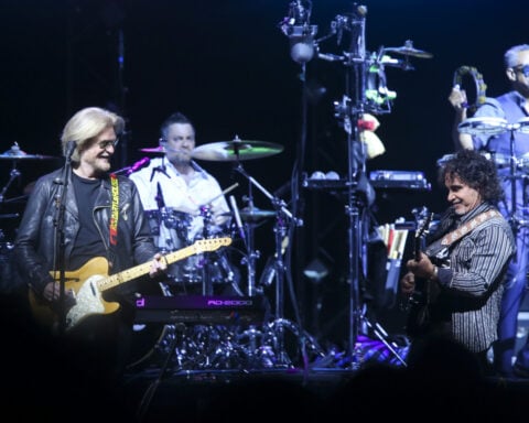Business spat between Daryl Hall and John Oates has been resolved in arbitration, attorneys say