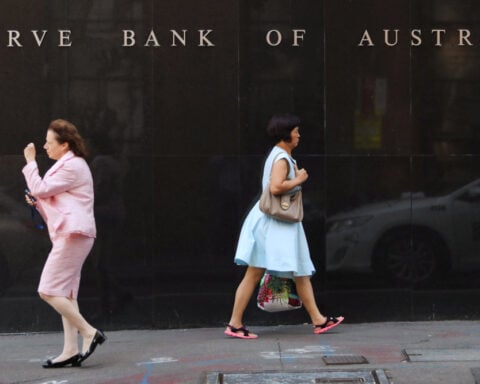 Australia's central bank downgrades economic outlook, productivity speed limit