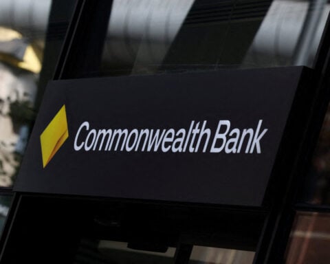 Australia's CBA posts record annual profit, but investors shed pricey shares
