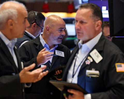 Trading Day: World stocks boom, Fed cut looms