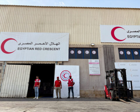 Turned back from Gaza, aid shipments languish in warehouses, on roadsides