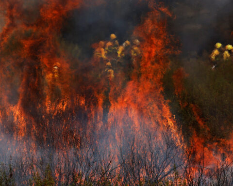 Volunteer firefighter dies in Spain as wildfires rage