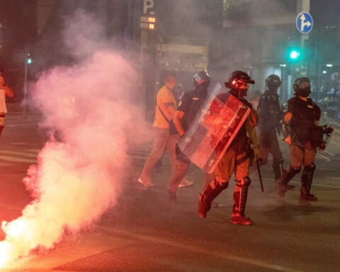 Serbia's police intervene to end standoff between ruling party supporters and anti-government protesters