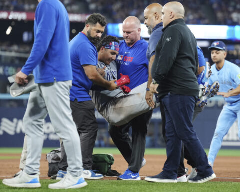 Cubs catcher Miguel Amaya carted off after injuring left ankle stepping on first base