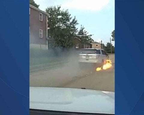 Vehicle in police pursuit catches fire while fleeing down road