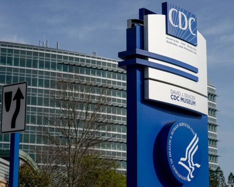Video shows crowds cheering as CDC officials who resigned walk out of building