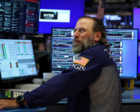 Trading Day: Fed hopes lift stocks, clip dollar