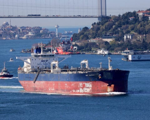Oil prices fall on demand concerns, but headed for weekly gain