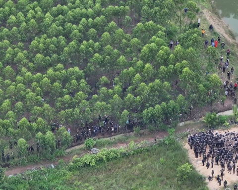 Thai police fire tear gas at Cambodian protesters at a disputed border village