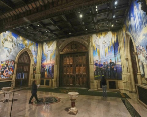 A massive mural honoring NYC immigrants now fills the entrance to St. Patrick’s Cathedral