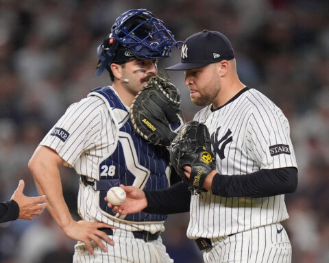 Boone defends his moves after Yankees bullpen falters again in playoff-opening loss to the Red Sox