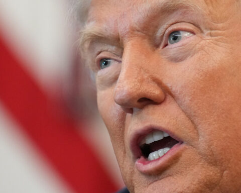 The Latest: Trump administration threatens no back pay for federal workers in shutdown