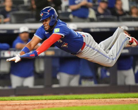 Judge rallies Yankees past Blue Jays 9-6 to save season and avert ALDS sweep