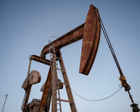 Oil prices edge up on worries about Russian output, higher US demand