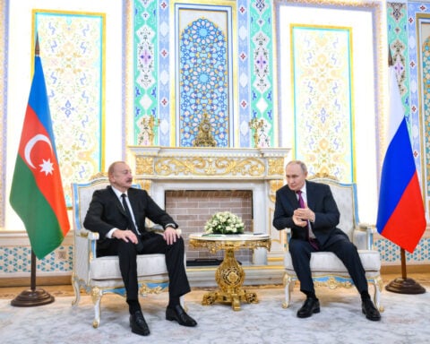 Azerbaijan releases Russian journalist to house arrest after Putin-Aliyev meeting