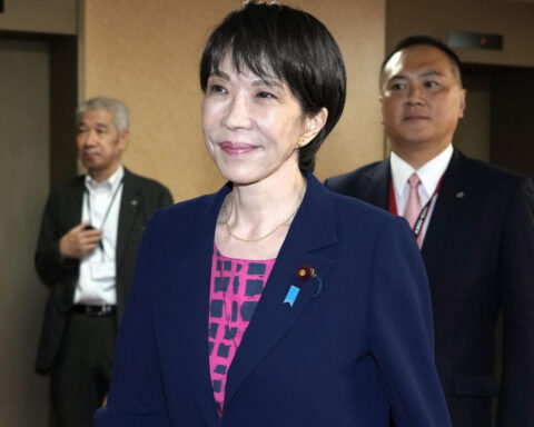 Citing unease over graft, Japan's Komeito leaves the longstanding ruling coalition headed by the LDP