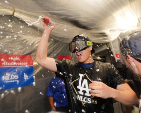 Dodgers rolling in defense of World Series title after closing out Phillies to reach NLCS