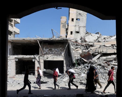 Gazans' joy tempered by shock as they eye remnants of homes after ceasefire