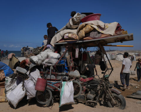 Some Palestinians pack up and move north toward their homes in Gaza after ceasefire goes into effect
