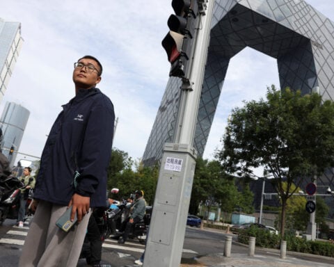 Trump ratchets up US-China trade war, promising new tariffs